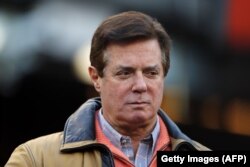 Пол Манафорт в Нью-Йорке на бейсбольном матче. 16 октября 2017 года