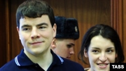 Russia -- Nikita Tikhonov and Yevgenia Khasis, charged with the double murder of Stanislav Markelov and Anastasia Baburina, in a Moscow court, 11Jan2011