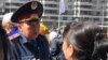 Kazakhstan, Nur-Sultan. Bakhytzhan Malibayev the First Deputy of the City Police department speaking to protesting women. 20 Sept 2019.