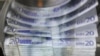 Belgium -- A machine counts and sorts out euro notes at the Belgian Central Bank in Brussels, 26Oct2011