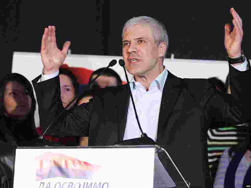 Caption: epa01228792 Serbian President Boris Tadic addresses the media, in Belgrade, after the announcement of the first unofficial results of his opponent lead in the presidental elections in Serbia, 20 January 2008.